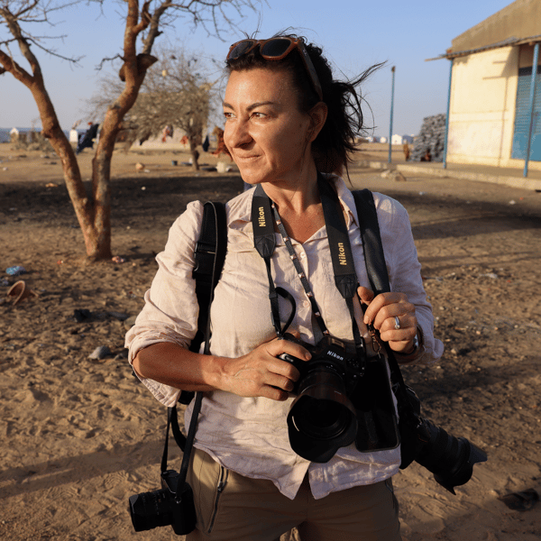 She documents war’s darkest truths — then returns home to her family